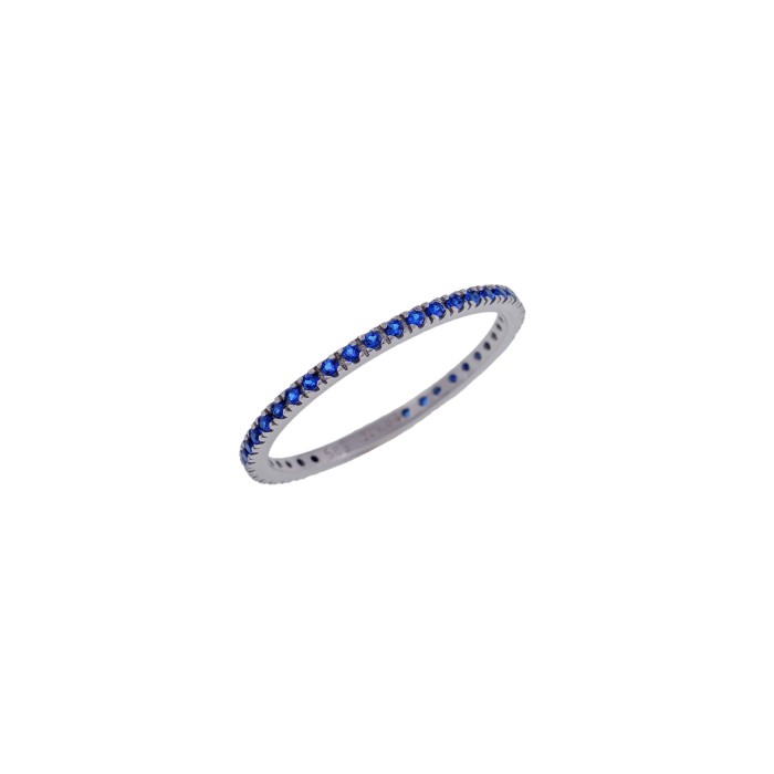 White gold ring with blue diamonds